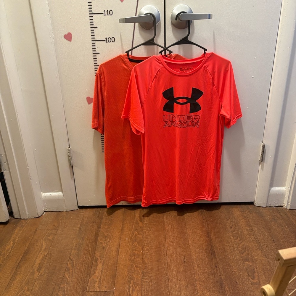 2 Under Armour Vibrant Orange T-shirts can be gender, neutral both size Large